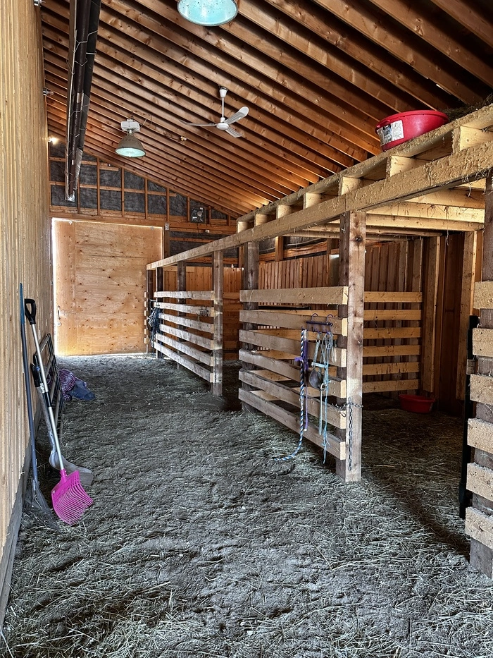 staged-inside-of-a-barn-in-dawson-creek-ranch-for-sale